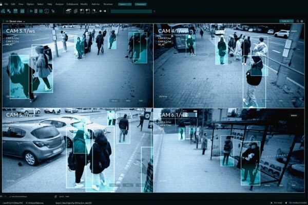 CCTV AI facial recognition camera authenticating people on street.