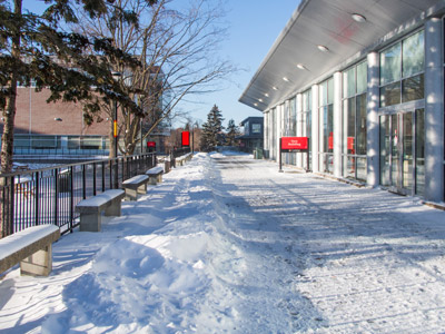 Outside of the Tory Building during winter at Carleton University.