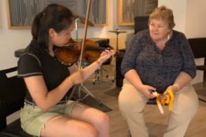 A woman playing violin