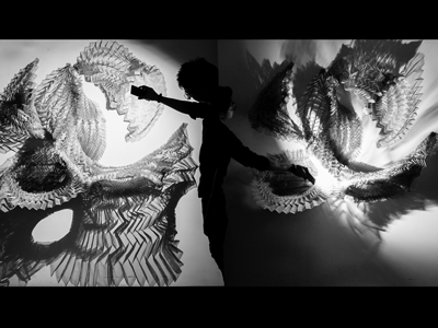 Students demonstrate Diluvio artwork.