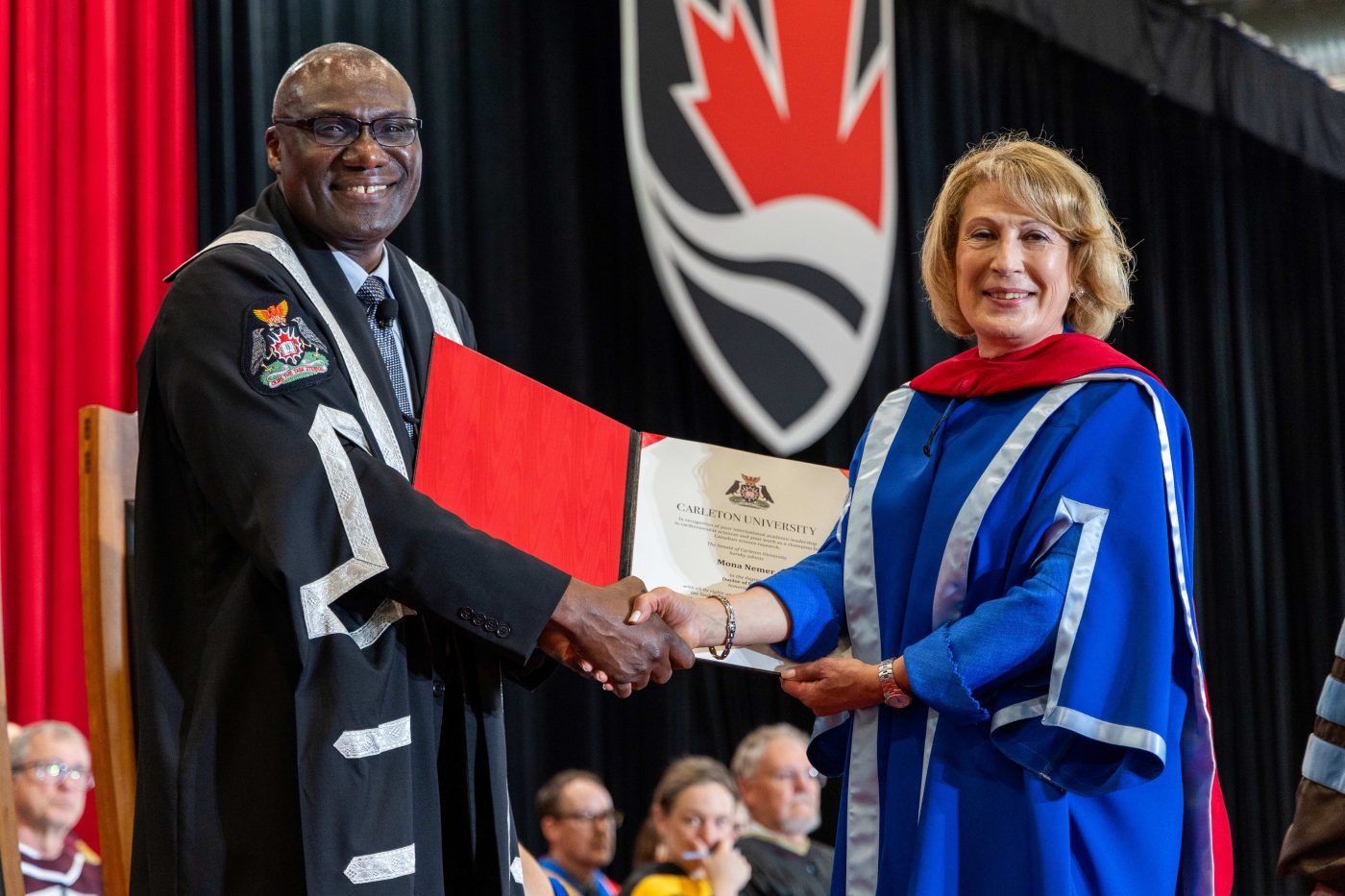 Mona Nemer receives her honorary degree.