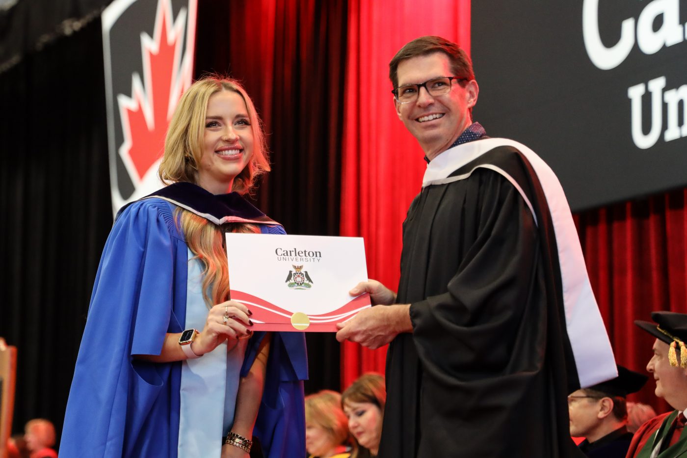 A student receiving a degree.