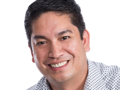 A headshot of Eddie Villarta against a plain white background.