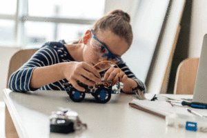 A girl works on an engineering project.