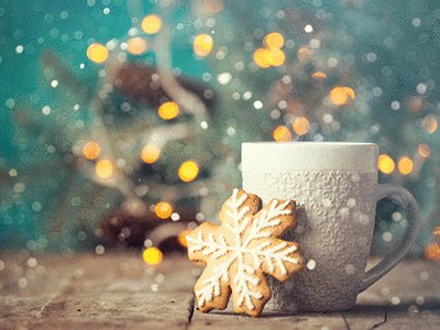An image of a cookie in the shape of a snowflake and a mug.