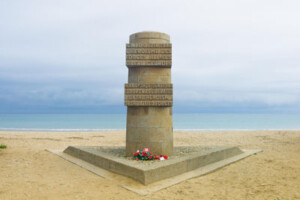 A memorial pillar stands on Juno Beach in France to commemorate D-Day operations during World War Two.