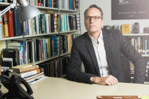 A photo of Prof. Marc Furstenau in his office.