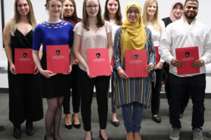 The Provost Scholar Award Recipients hold their awards.