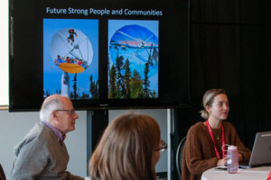 A breakout group meets during one of the sessions.
