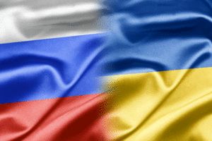 An image of the Russian and Ukrainian flags.