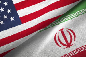 Sections of the flags of the United States and Iran are placed next to each other.