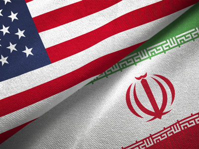Sections of the flags of the United States and Iran are placed next to each other.
