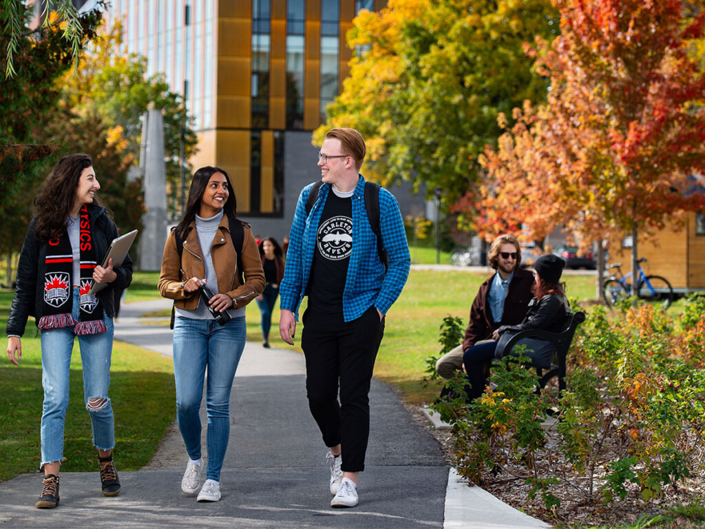 Students walking and talking on campus