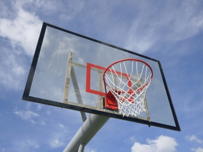 Basketball Hoop against a blue sky