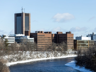 The south end of campus next to the Rideau River during winter.