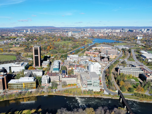 Aerial view of Carleton University's campus and the Rideau River