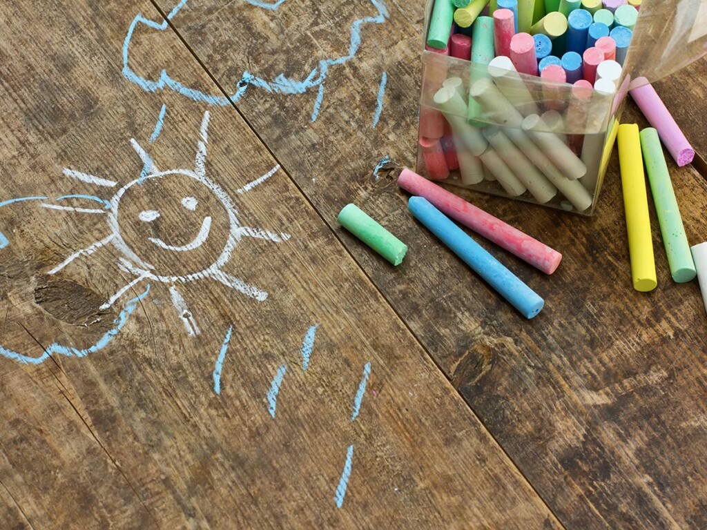 Coloured chalk on a bench (Shutterstock)