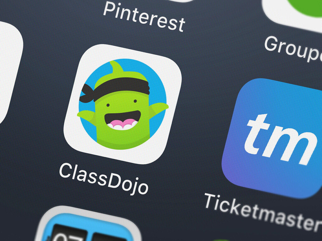 The ClassDojo app icon on a mobile phone.