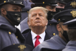 Trump surrounded by police.