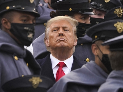 Trump surrounded by police.