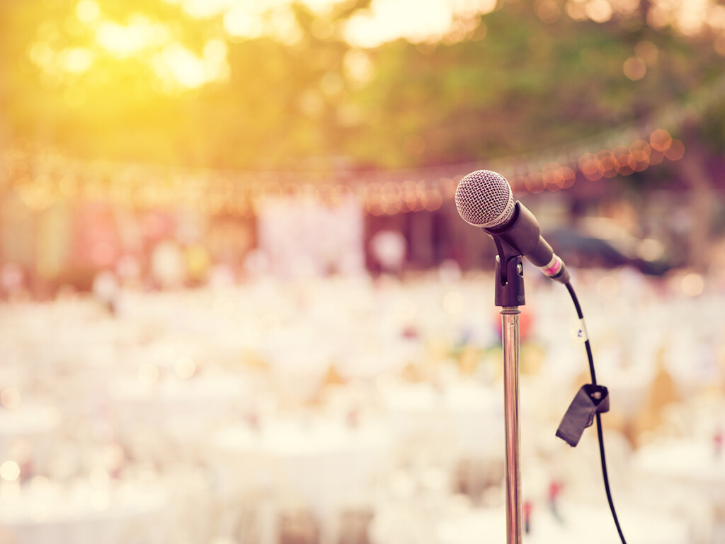 A microphone on stage (Shutterstock)