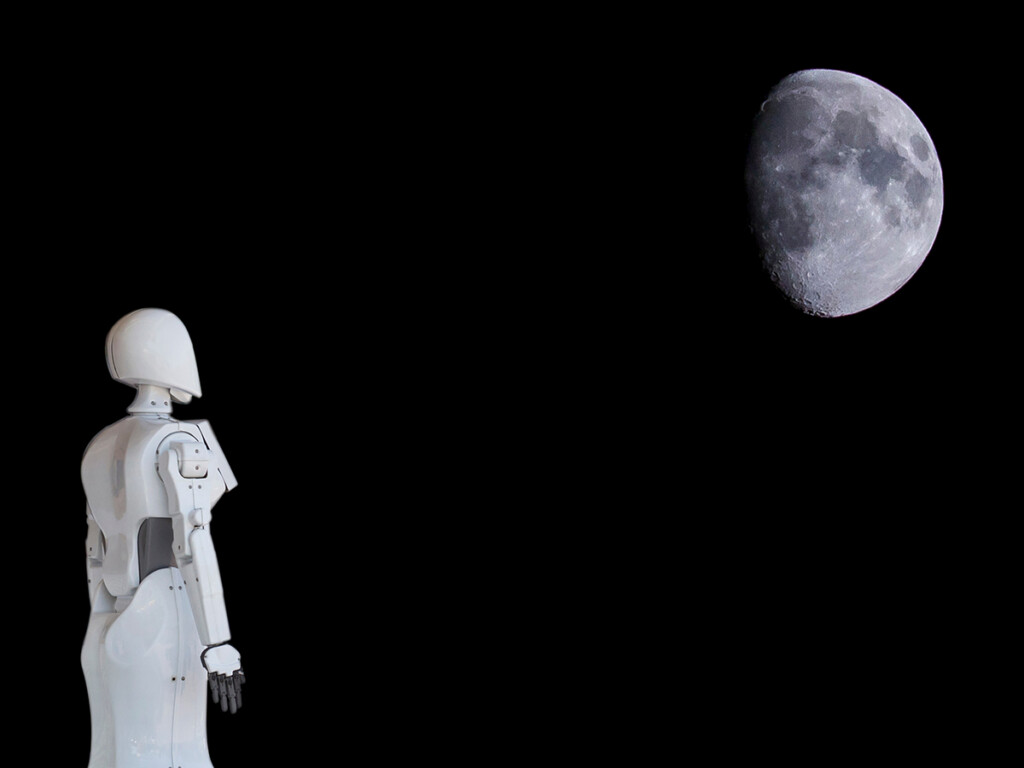 A robot looking up at the moon