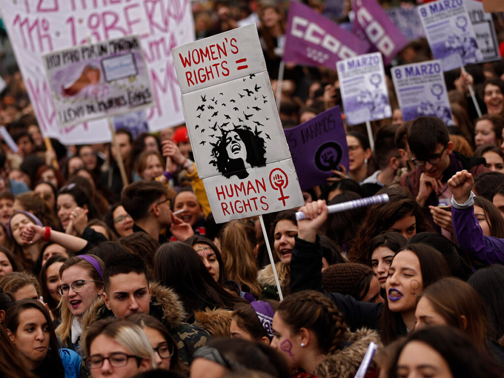 Here people shout slogans during a protest at the Sol square during the International Women’s Day in Madrid, March 8, 2018