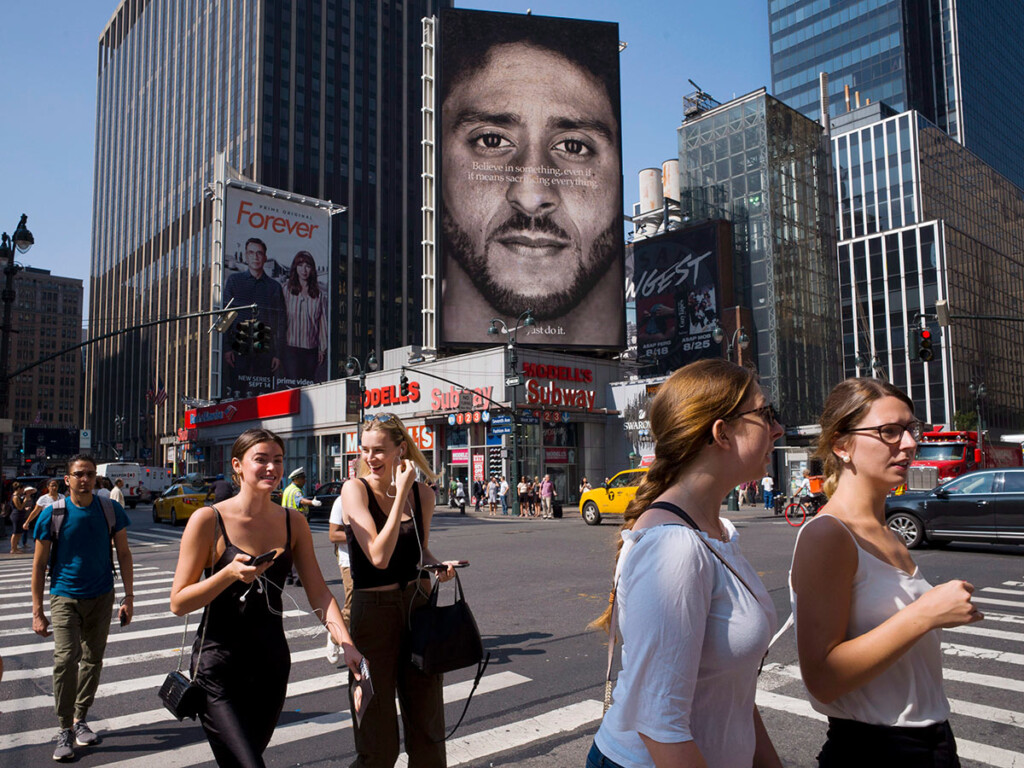 Nike ad in New York in 2018, showing former San Francisco 49ers quarterback Colin Kaepernick after his 2016 kneeling protest. (AP Photo/Mark Lennihan)