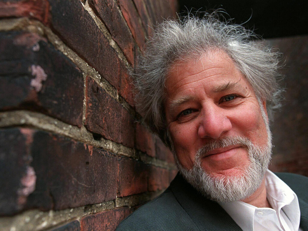 Author Michael Ondaatje poses at Coach House Press in Toronto (CP PHOTO/Kevin Frayer)