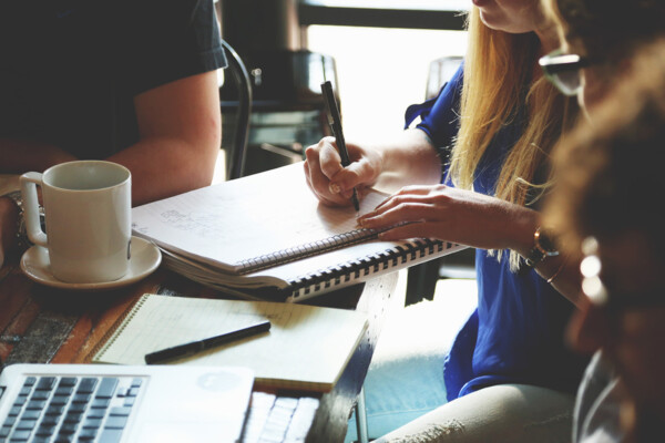 Students working at a desk.