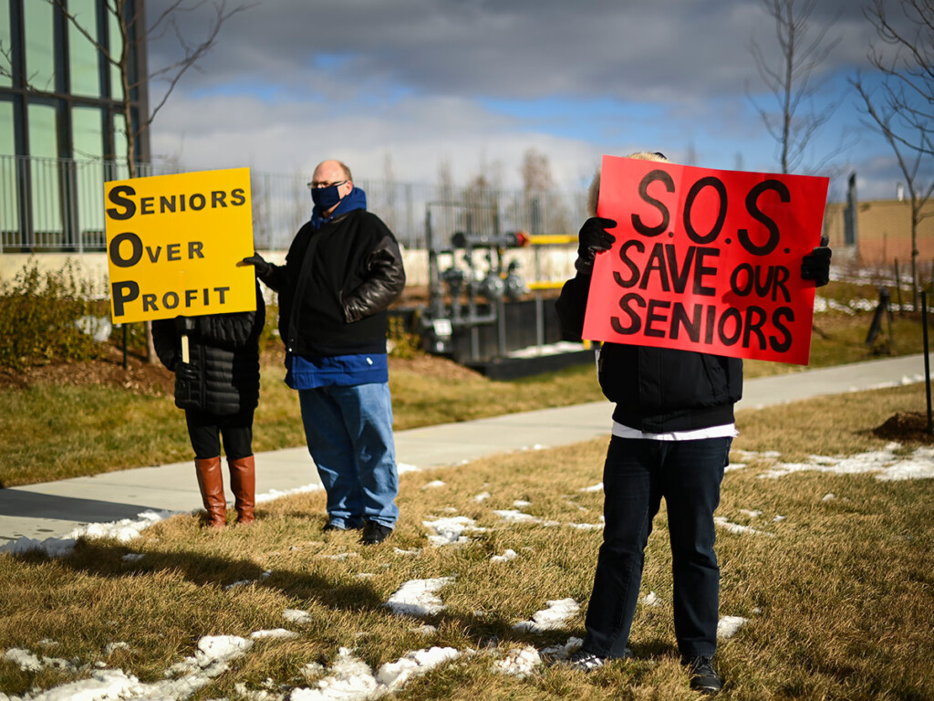 People protest outside the Tendercare Living Centre long-term care facility during the COVID-19 pandemic in Scarborough, Ont., in December 2020.