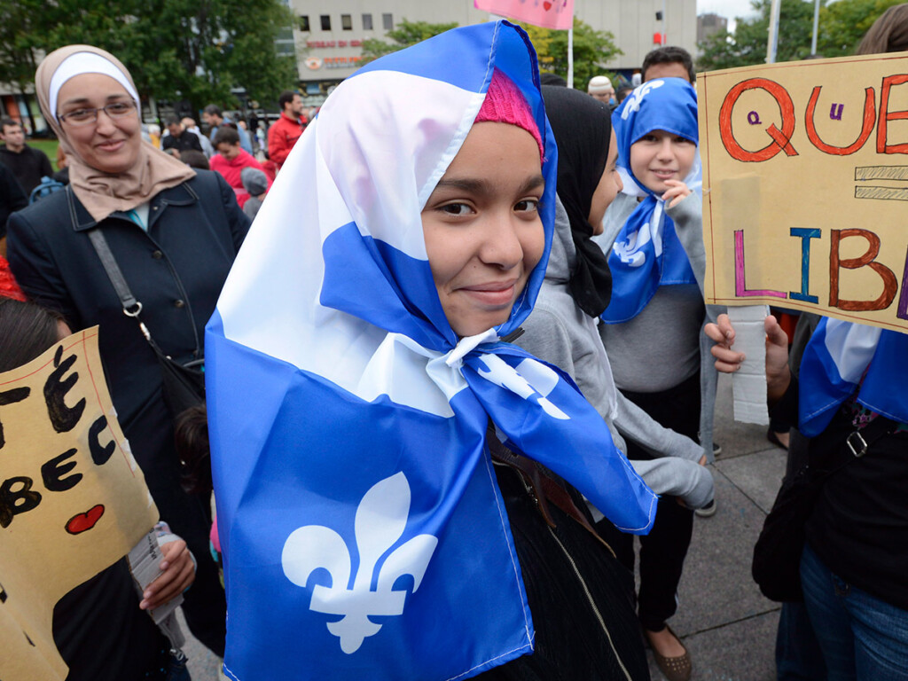 Demonstrators take part in a protest against Quebec’s proposed Values Charter in Montreal in September 2013. (THE CANADIAN PRESS/Ryan Remiorz)