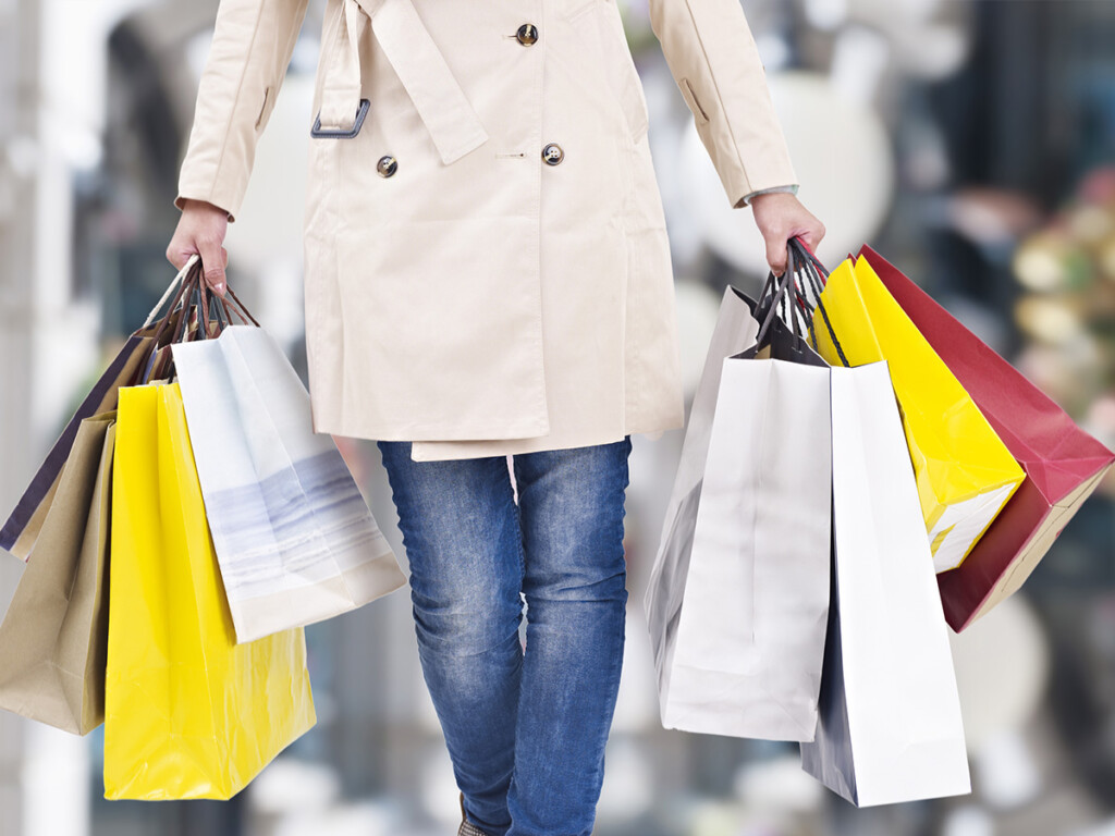 A woman holding shopping bags