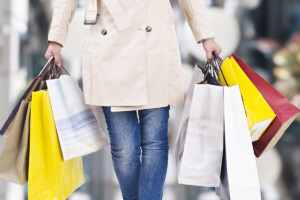 A woman holding shopping bags