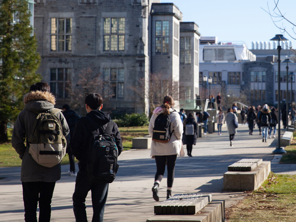 Students walking away on a Canadian campus
