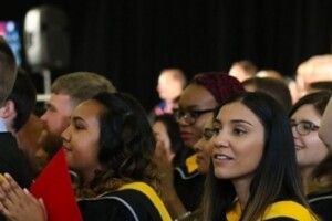 Graduates enjoy their convocation ceremony in the University Fieldhouse