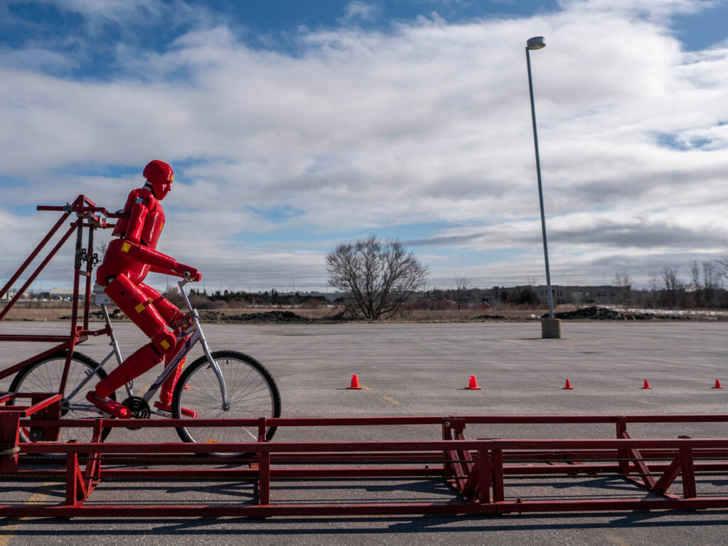 The Carleton University Crash Dummy team sets up a rear-end collision test between a motor vehicle and cyclist in co-ordination with the Ottawa Police Service Collision Investigation Unit on Friday, March 29, 2019, at the Canadian Tire Centre.