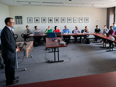 Systems and Computer Engineering Prof. Mohamed Ibnkahla speaks to an audience at the first general meeting of the “System-level Security for IoT-enabled e-Health Systems” project on June 28, 2019.