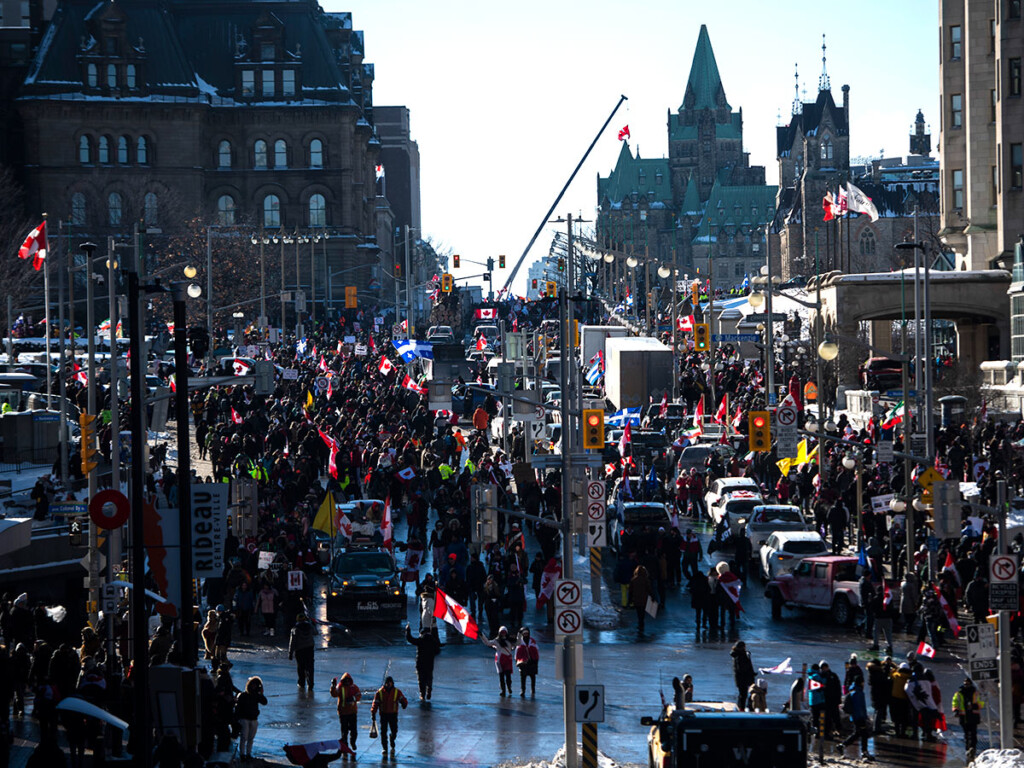 People and vehicles fill Wellington Street near Parliament Hill at the beginning of the so-called freedom convoy occupation of Ottawa in late January, 2022. THE CANADIAN PRESS/Justin Tang