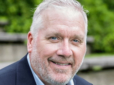 A photo of Greg Brown.