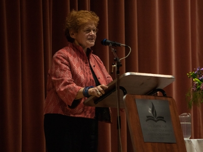 Historian Deborah Lipstadt speaks at a podium.