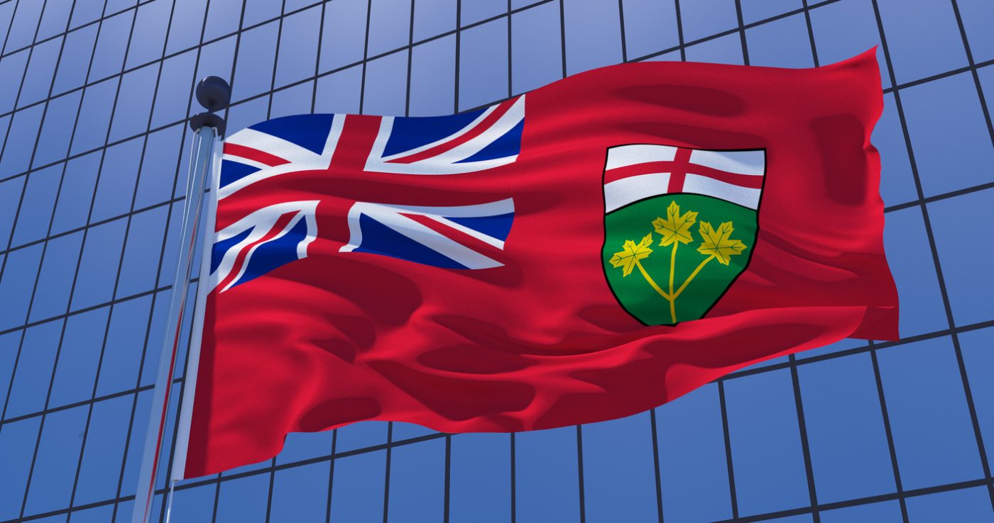 Ontario flag on skyscraper building background. Canada. Toronto, Ottawa, Vancouver, Winnipeg. Business concept. 3d illustration