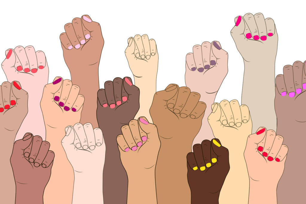 Female hands on a white background. A symbol of the feminist movement, struggle and resistance.