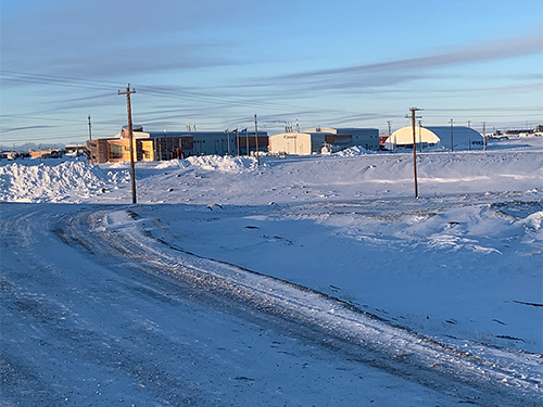 A community in Northern Canada covered in snow.