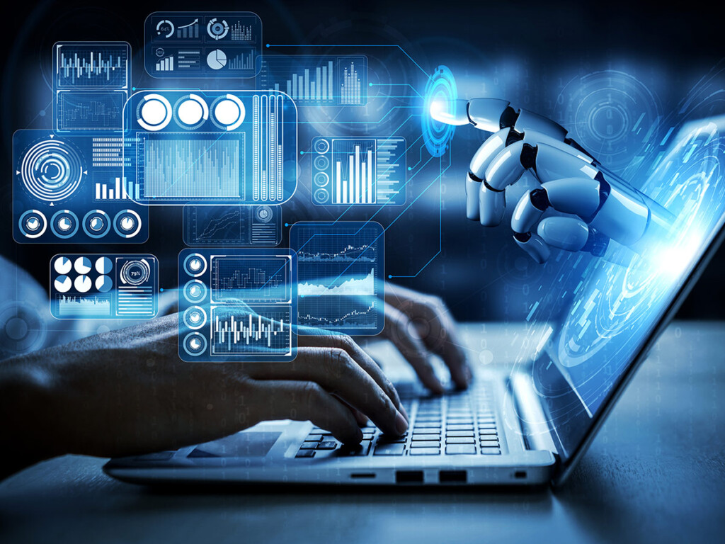 A pair of hands typing on a laptop, and a hand representing AI coming out from the screen.