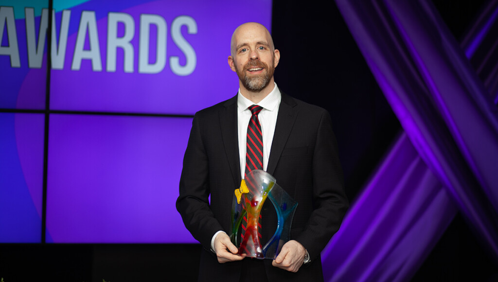 President Benoit-Antoine Bacon accepts the Transformational Leader for Mental Health Award