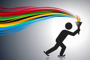 An outline of a person skating and holding an Olympic torch. A stream of Olympic ring colours trail behind the figure.