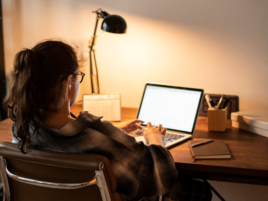 Student on a laptop at home