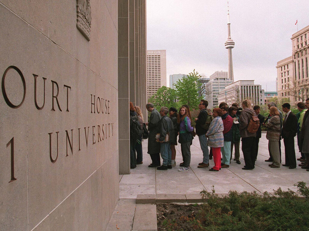 A lineup outside a courthouse for the trial of Paul Bernardo in 1995