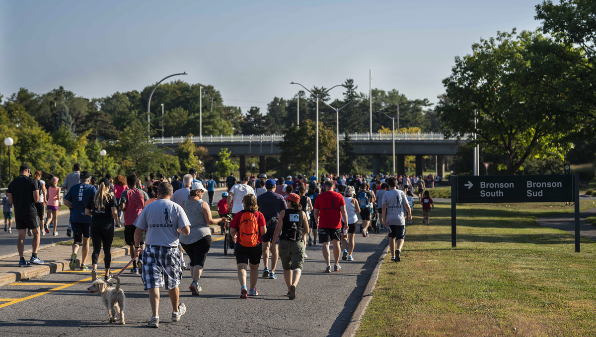 Runners on Colonel By Drive participate in the 2018 Terry Fox Run, one of the many Throwback homecoming events that took place in September.